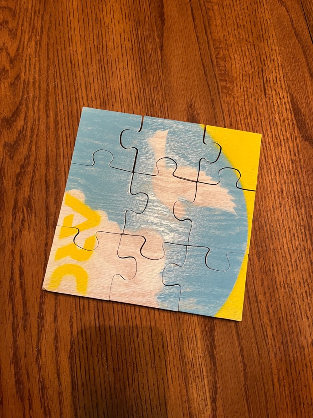 Wooden puzzle, scenic sky picture.